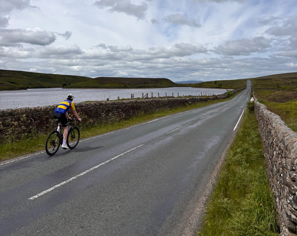 Club rider on a reservoir road above Halifax
